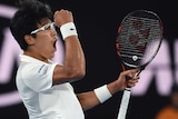 South Korea's Chung Hyeon pumps his fist after winning a point against Novak Djokovic at the Australian Open.