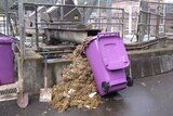 A pile of wet wipes is removed
