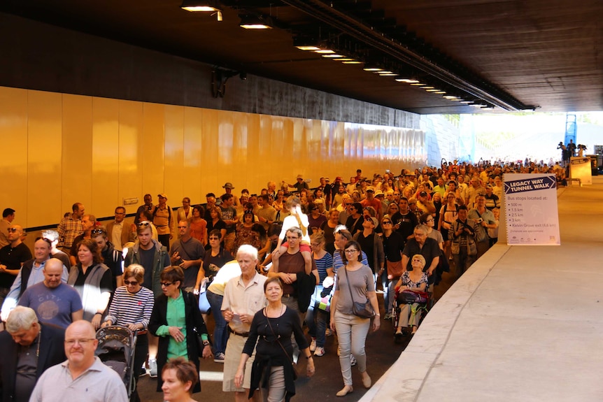 Pedestrians enter Legacy Way