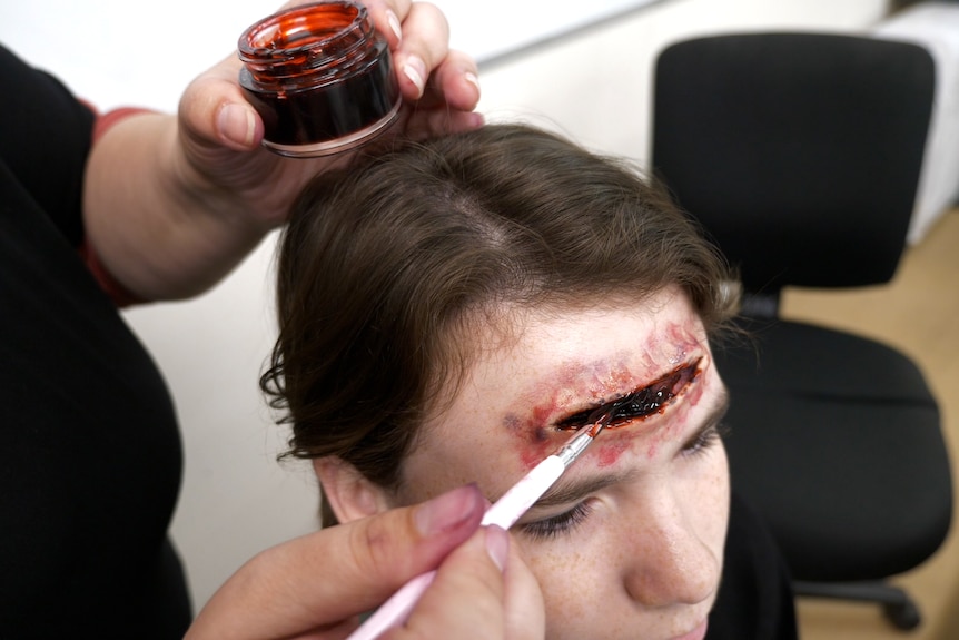 Actor get fx make up to forehead 