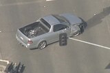 Aerials image of a silver ute.