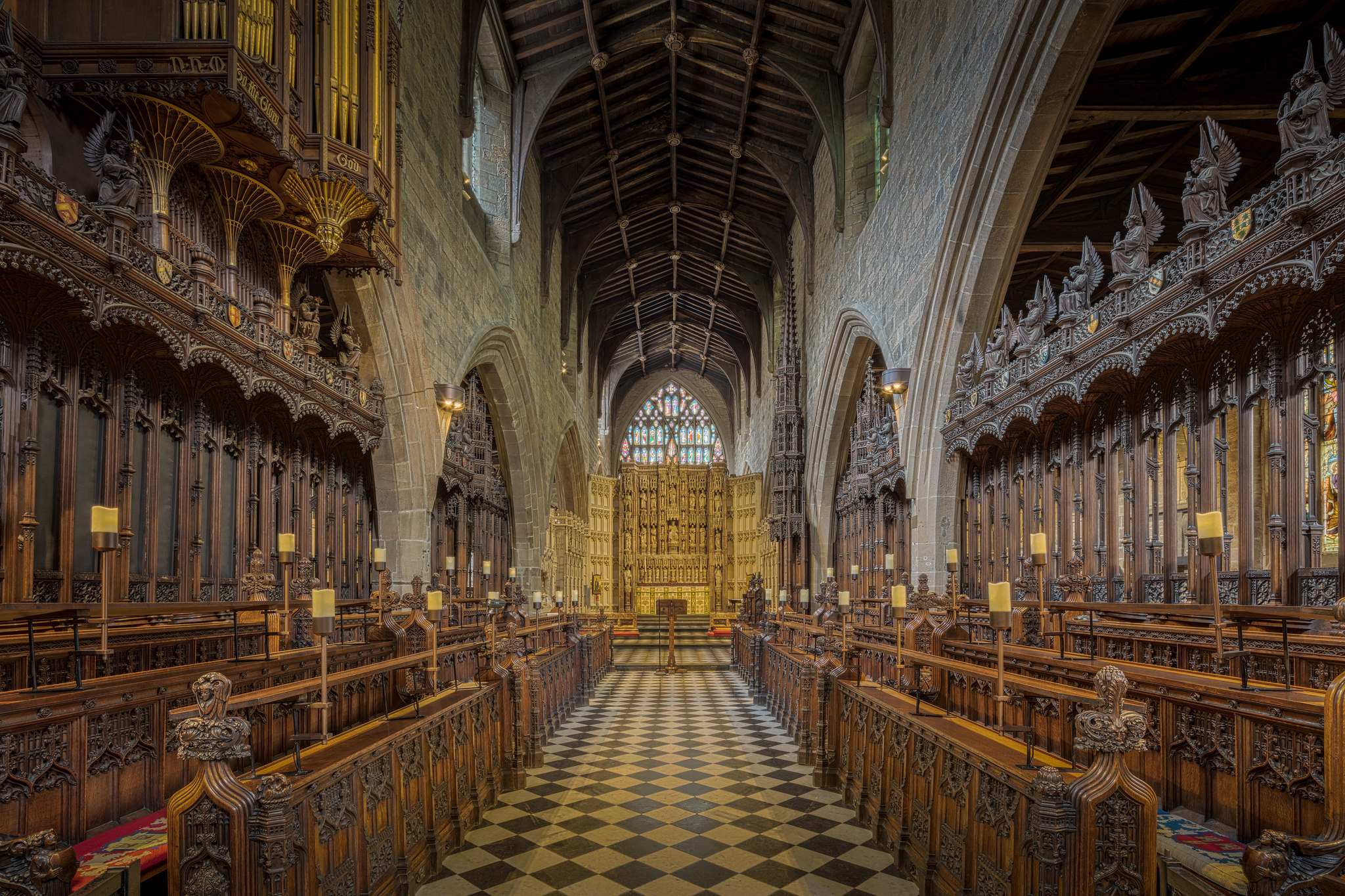 The ornate central aisle of Newcastle Cathedral pictured empty, looking from the choir pit to the altar.