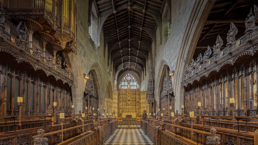 The ornate central aisle of Newcastle Cathedral pictured empty, looking from the choir pit to the altar.