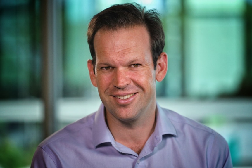 Matt Canavan wears a blue collared shirt.