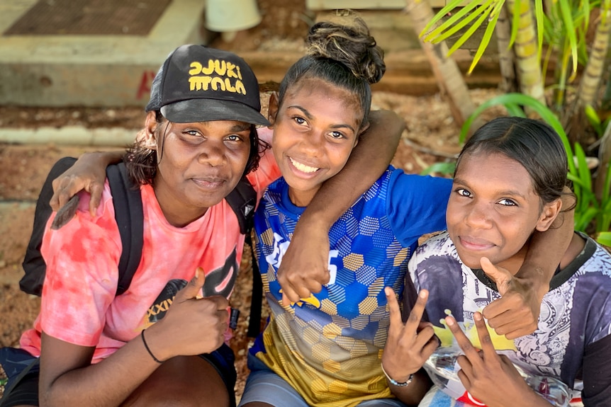 Flood evacuees Elsie Nulgit and two other young Aboriginal women in Derby, January 2023.