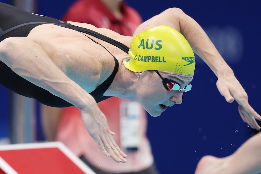 Swimming Cate Campbell diving off the blocks. 