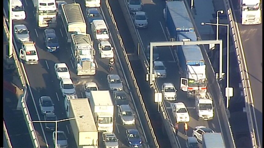 Aerial photo of a traffic jam on the West Gate Freeway.