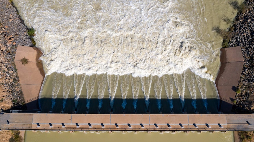 An aerial photo of water flowing through the gates at Lake Menindee, April 2021