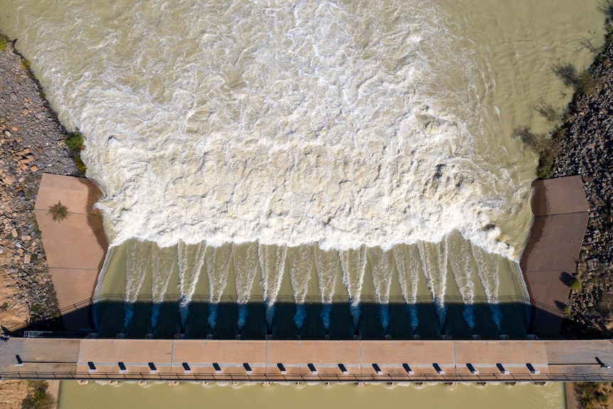 An aerial photo of water flowing through the gates at Lake Menindee, April 2021