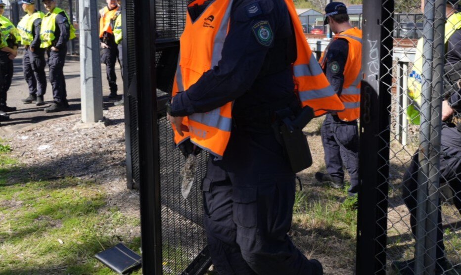 A knife found in police hands during a search of a crime scene.
