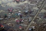 Aerial view of Meulaboh in Aceh after the tsunami hit ... Indonesian President Susilo Bambang Yudhoyono says a warning system could have saved lives.