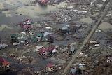 Aerial view of Meulaboh in Aceh after the tsunami hit ... Indonesian President Susilo Bambang Yudhoyono says a warning system could have saved lives.