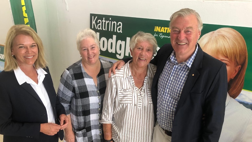 Four politicians smile at a campaign event on the South Coast of NSW.