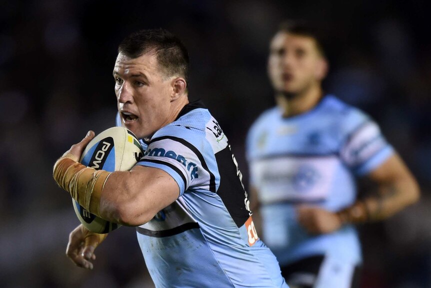 Paul Gallen runs the ball up for Cronulla against the Roosters