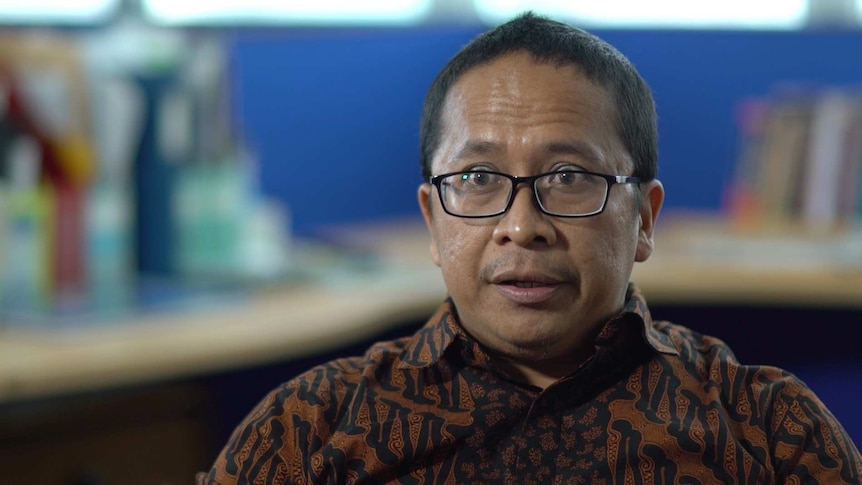 Indonesian terrorism analyst Adhe Bhakti speaks to the camera