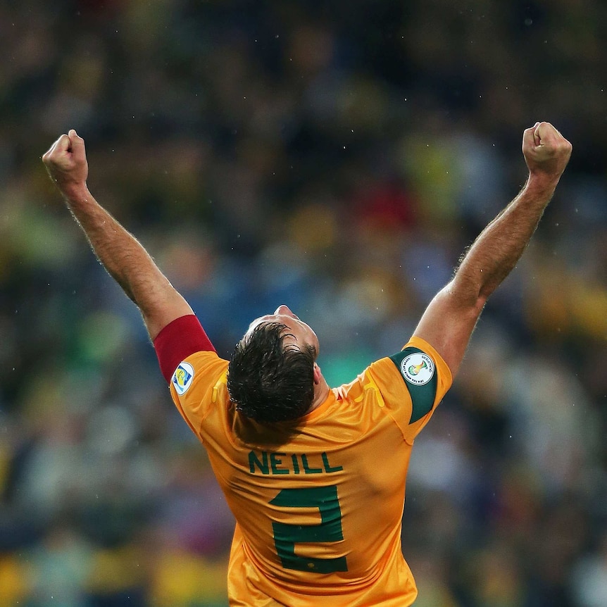 Socceroos captain Lucas Neill celebrates victory over Iraq
