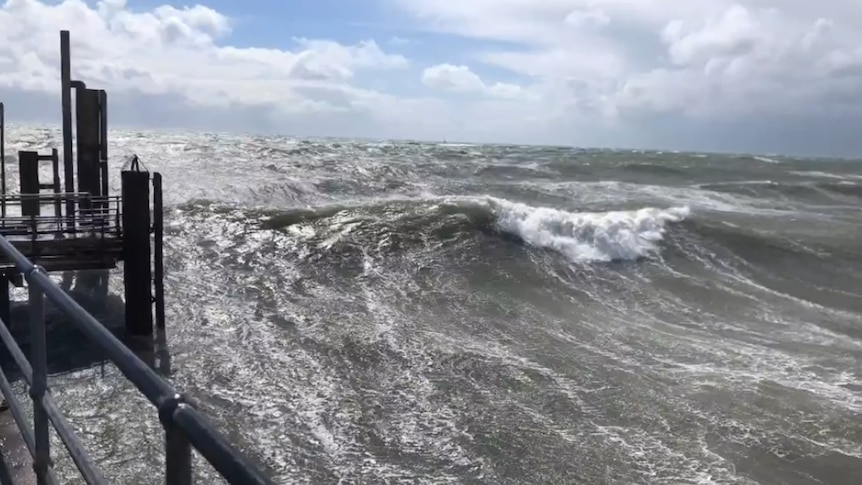 Strong waves during wild weather at Holdfast Bay.
