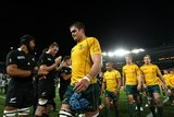 Dejected James Horwill leads off his defeated side after NZ semi loss