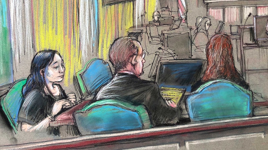 A court sketch showing Yujing Zhang while she listens at a hearing before a magistrate.