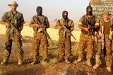 Reece Harding and Joe Akerman with Kurdish YPG fighters