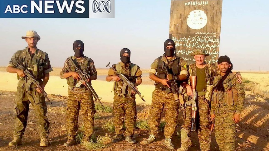 Reece Harding and Joe Akerman with Kurdish YPG fighters