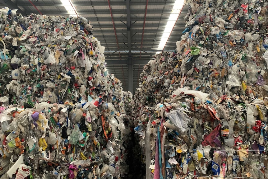 A close-up shot of two tower pile of rubbish.