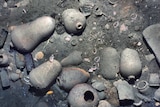 Ceramic jars and other items from the 300-year-old shipwreck of the Spanish galleon San Jose