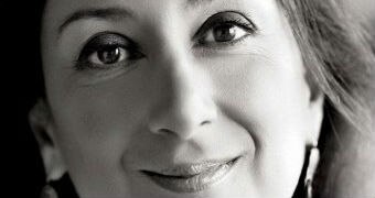 A black and white close-up of journalist Daphne Caruana Galizia.