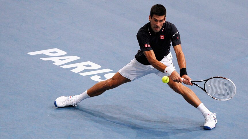 Djokovic stretches for a backhand in Paris
