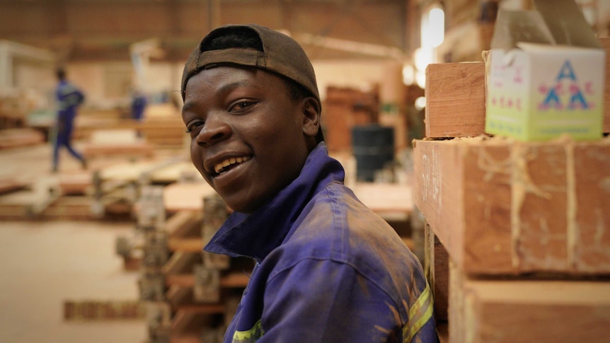 Zambian worker at a Chinese-owned furniture factory.