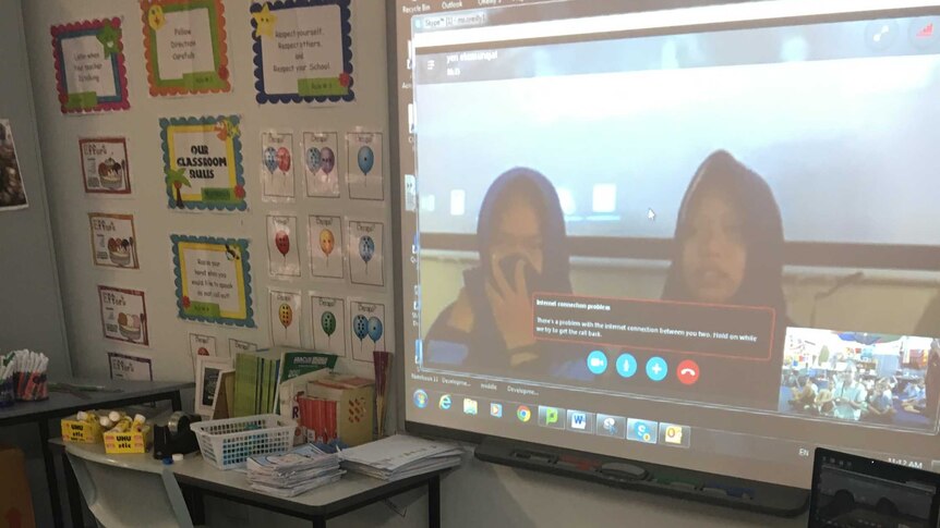 A student from Townsville Grammar School speaks with students from an Indonesian primary school on Skype.