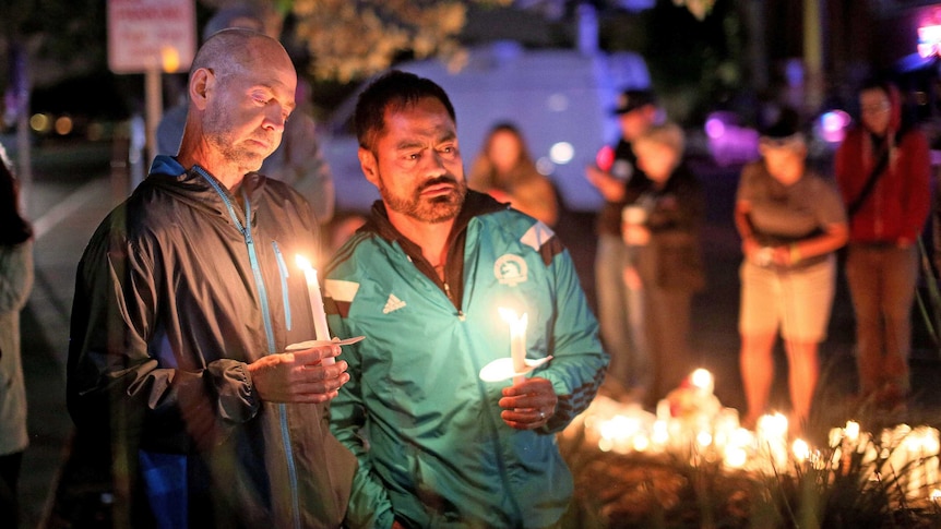 Mourners pay tribute to the victims of the Orlando shooting during a memorial service in San Diego on Jun 13, 2016.