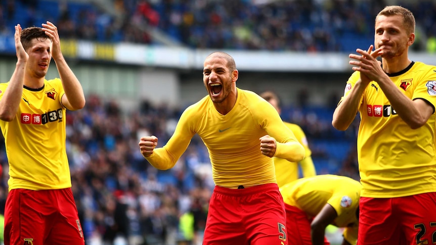 Adlene Guedioura (C) and Watford team-mates celebrate their win over Brighton and Hove Albion.