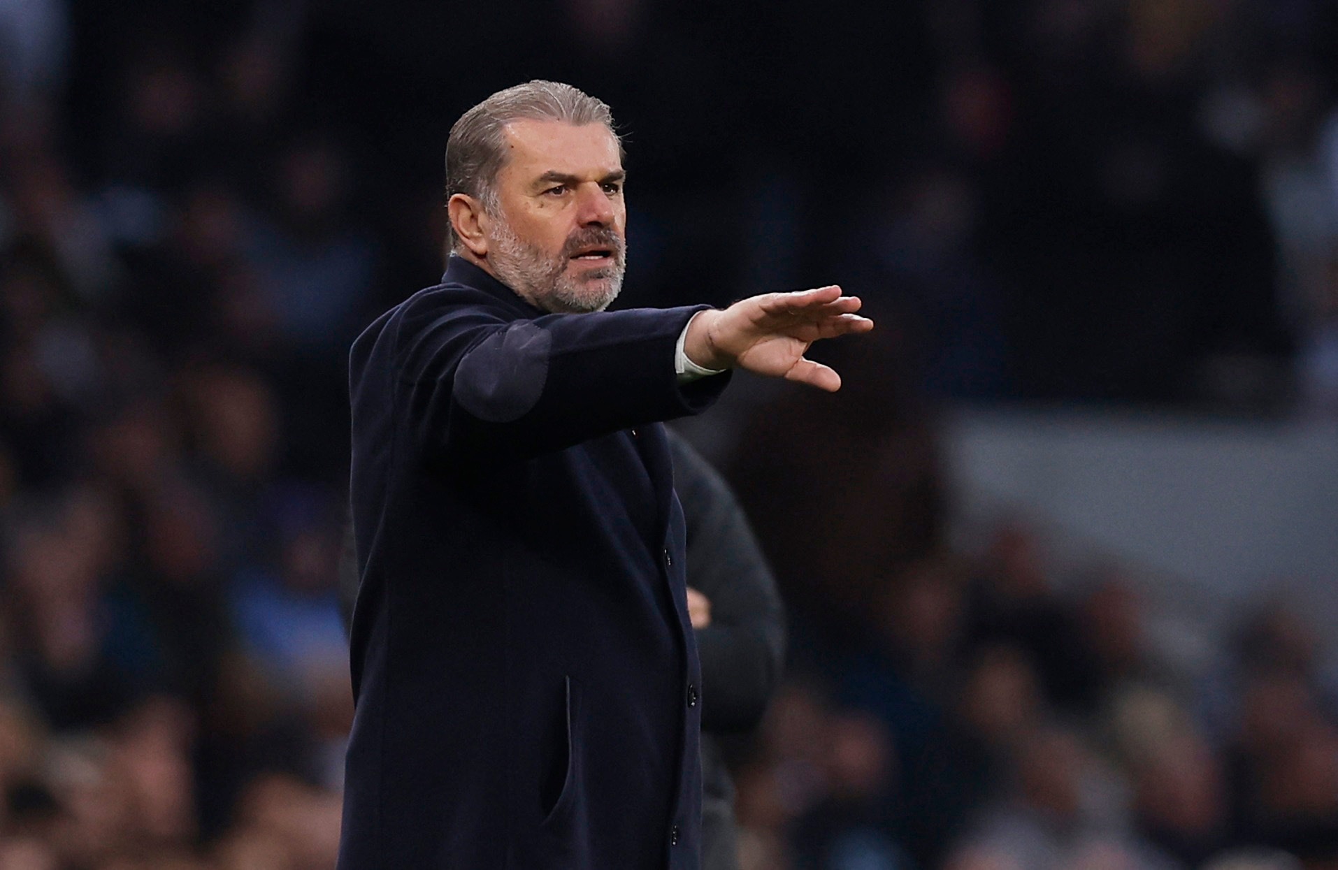Tottenham Hotspur manager Ange Postecoglou guestures on the touchline