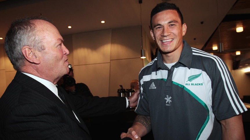 Welcome aboard: Graham Henry congratulates Sonny Bill Williams on his selection.