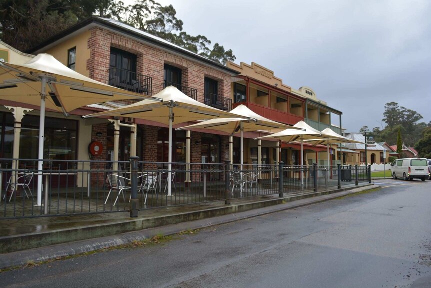 Empty outdoor dining areas in Strahan Village on Tasmania's West Coast