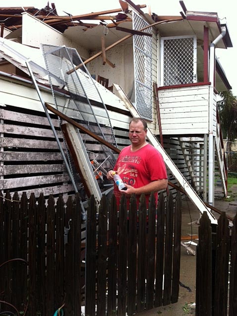 Top storey of house demolished during Townsville storm.