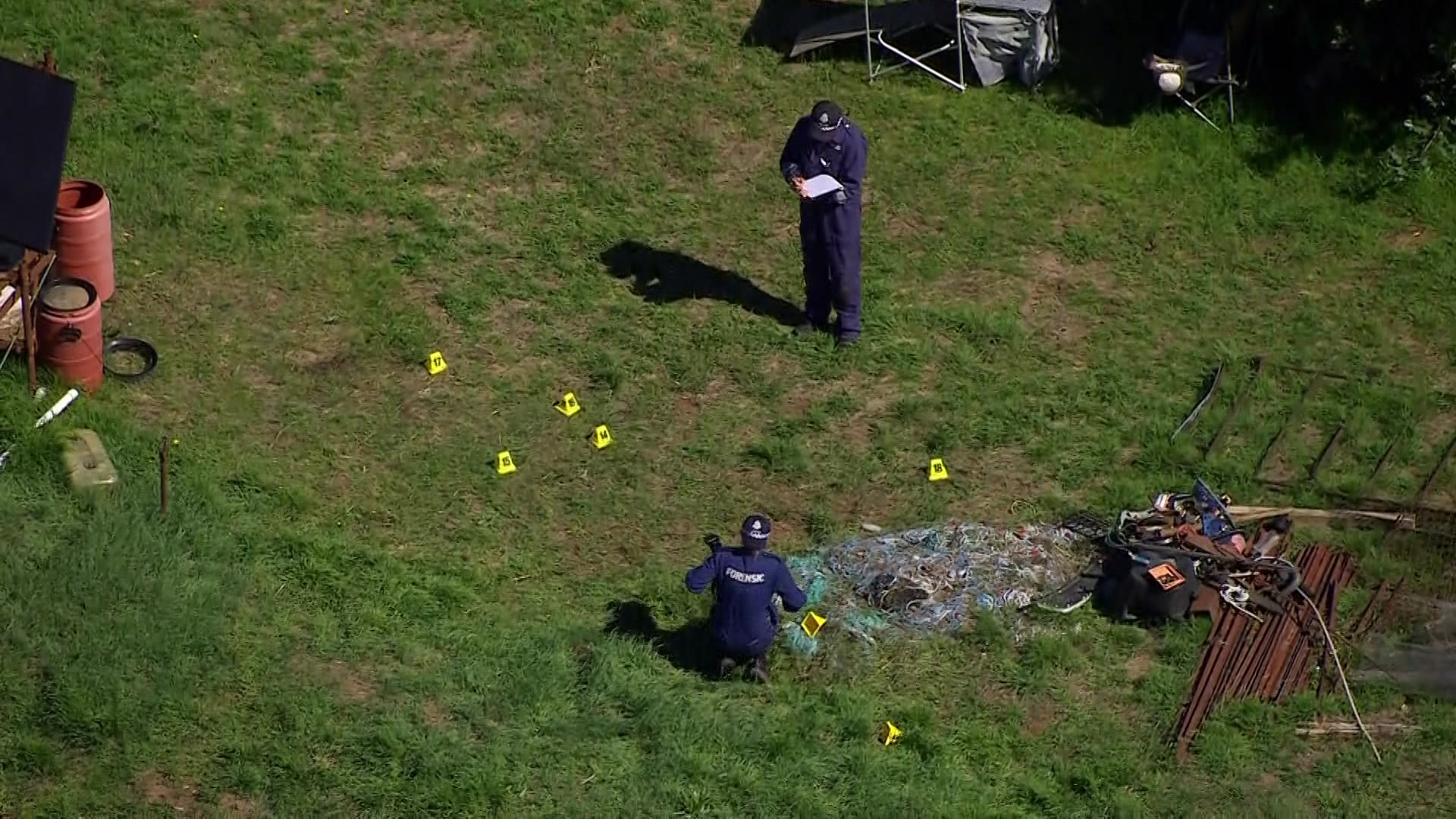 Two forensic investigators working