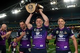 Cameron Smith, Cooper Cronk and Billy Slater with the NRL trophy