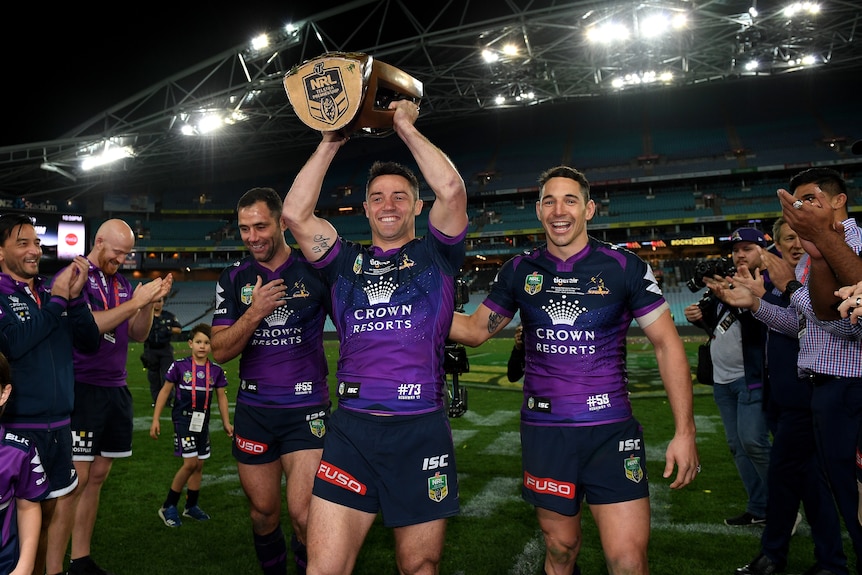 Cameron Smith, Cooper Cronk and Billy Slater with the NRL trophy