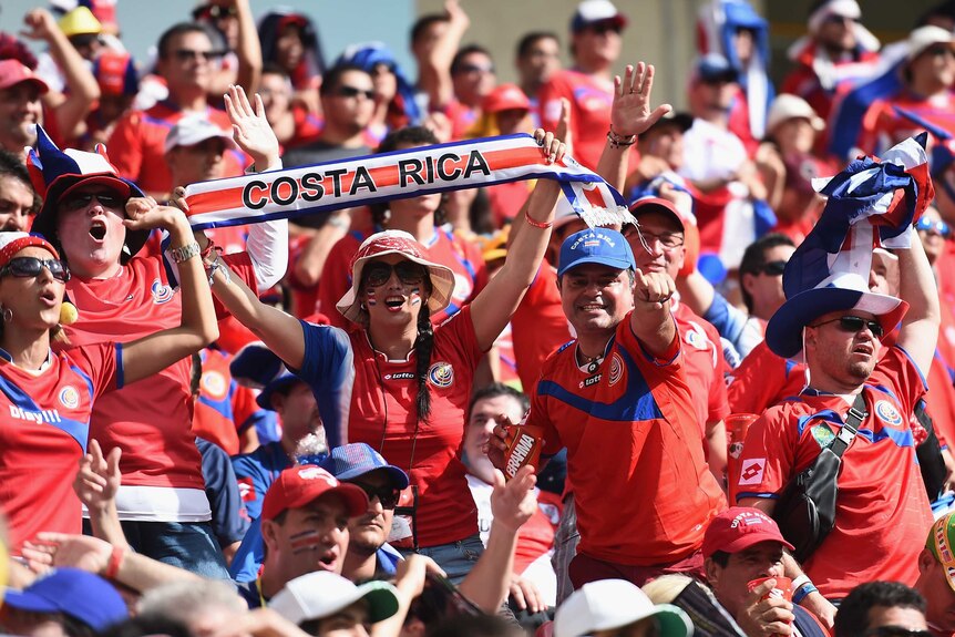 Costa Rica fans celebrate win over Italy