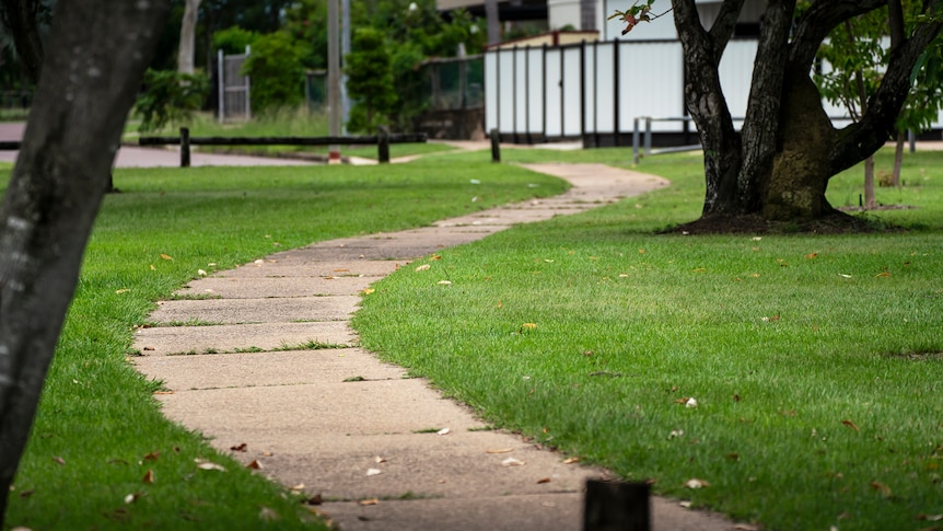A winding footpath through a Darwin park. 