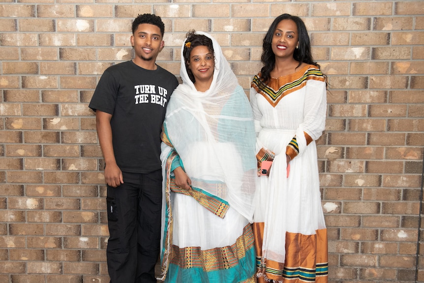 Meseret flanked by her son Abel and daughter Helen.