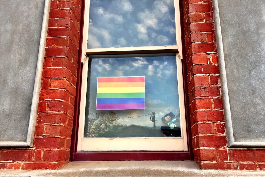 A rainbow poster inside a Mt Alexander council building