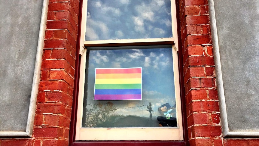 A rainbow poster inside a Mt Alexander council building