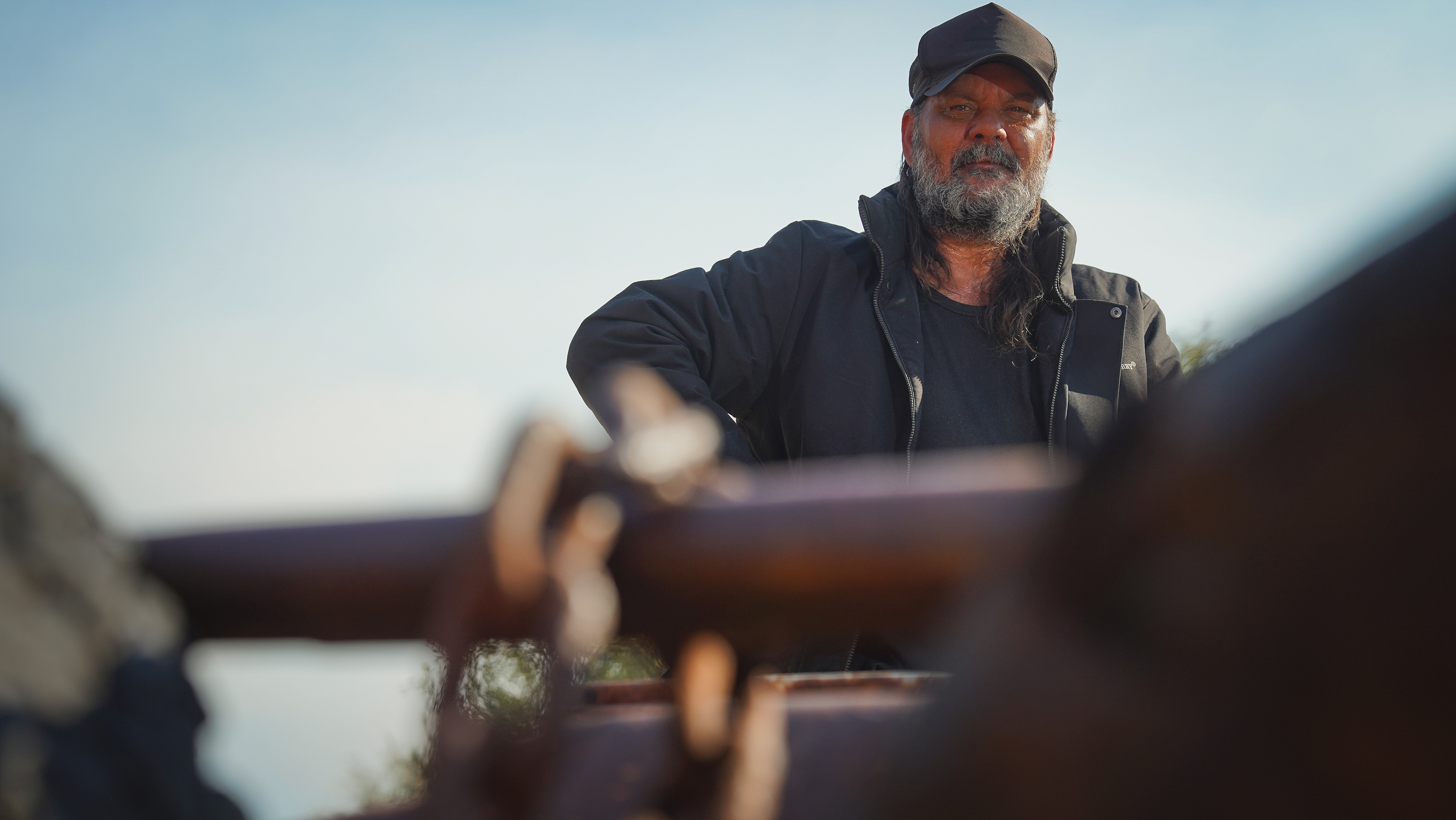 Warwick Thornton poses behind his bull catcher.