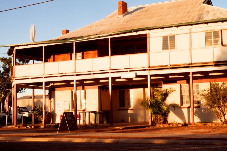 A historic country pub in the late afternoon light.