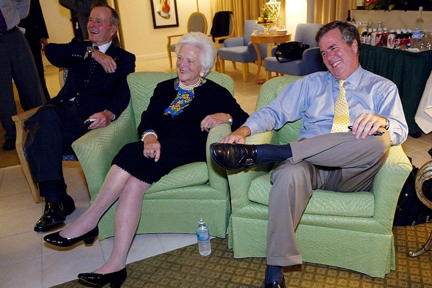 George HW Bush with his wife Barbara and son Jeb