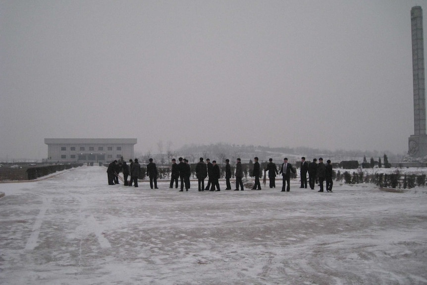 Students on a snowy day after an exam; Kim Jong-il’s death would be announced just a few days later, 2011