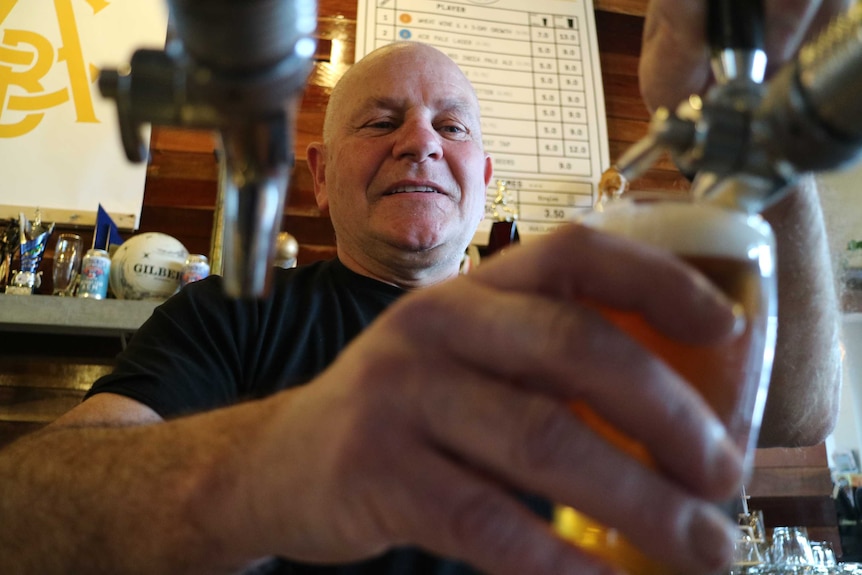 Peter Parry pouring a craft beer